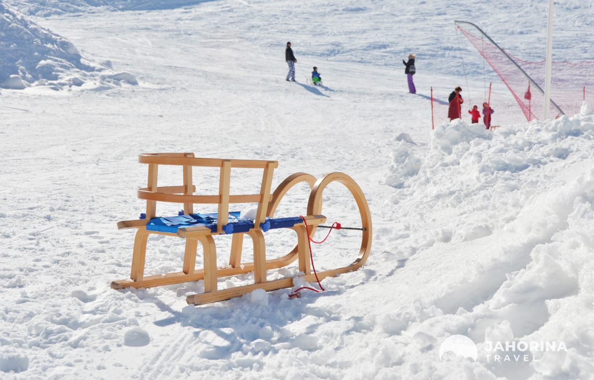 Children's sleds in the snow